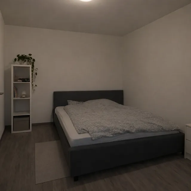 Schlafzimmer vorher: kahle weiße Wände, ein schlichtes Bett und ein kleines Regal